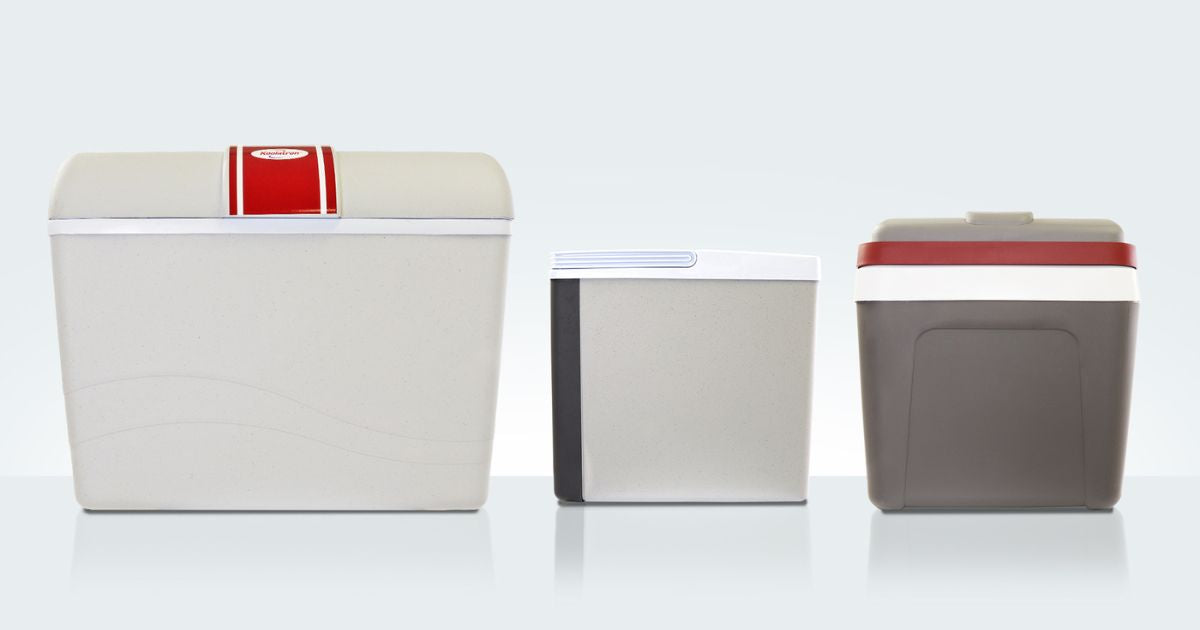 Product shot of three Kool-atronthermoelectric coolers on a pale blue background
