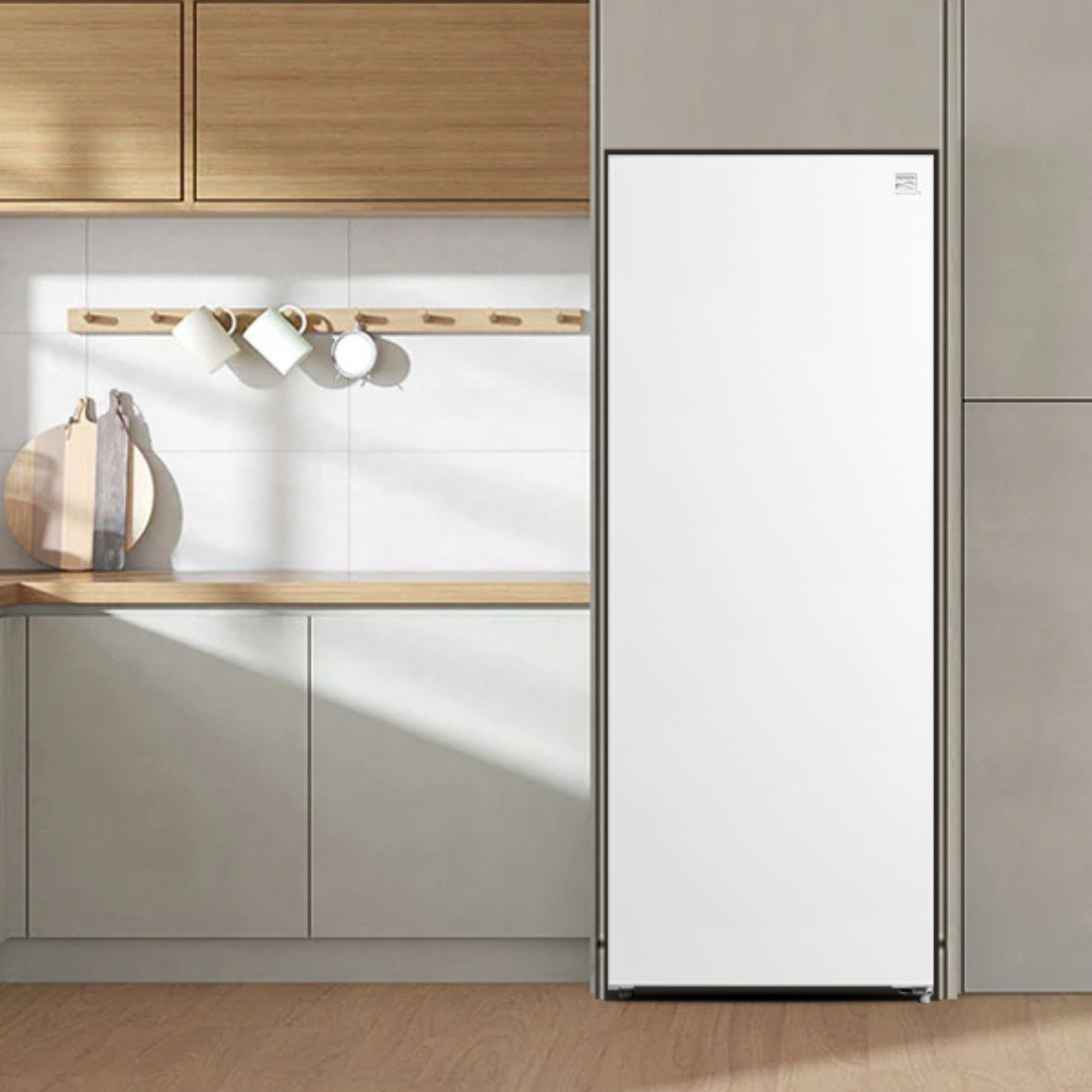 Kenmore 7 cubic foot convertible upright freezer refrigerator in a bright clean kitchen with light gray cabinets and wood butcher block counters